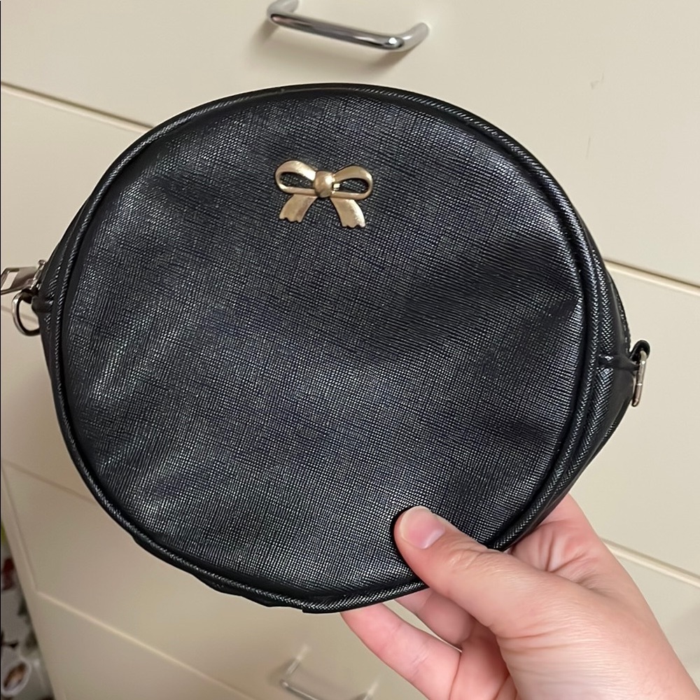 Elegant Black Clutch with Gold Accent